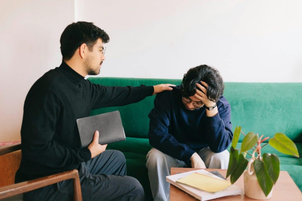 man at doctor visit