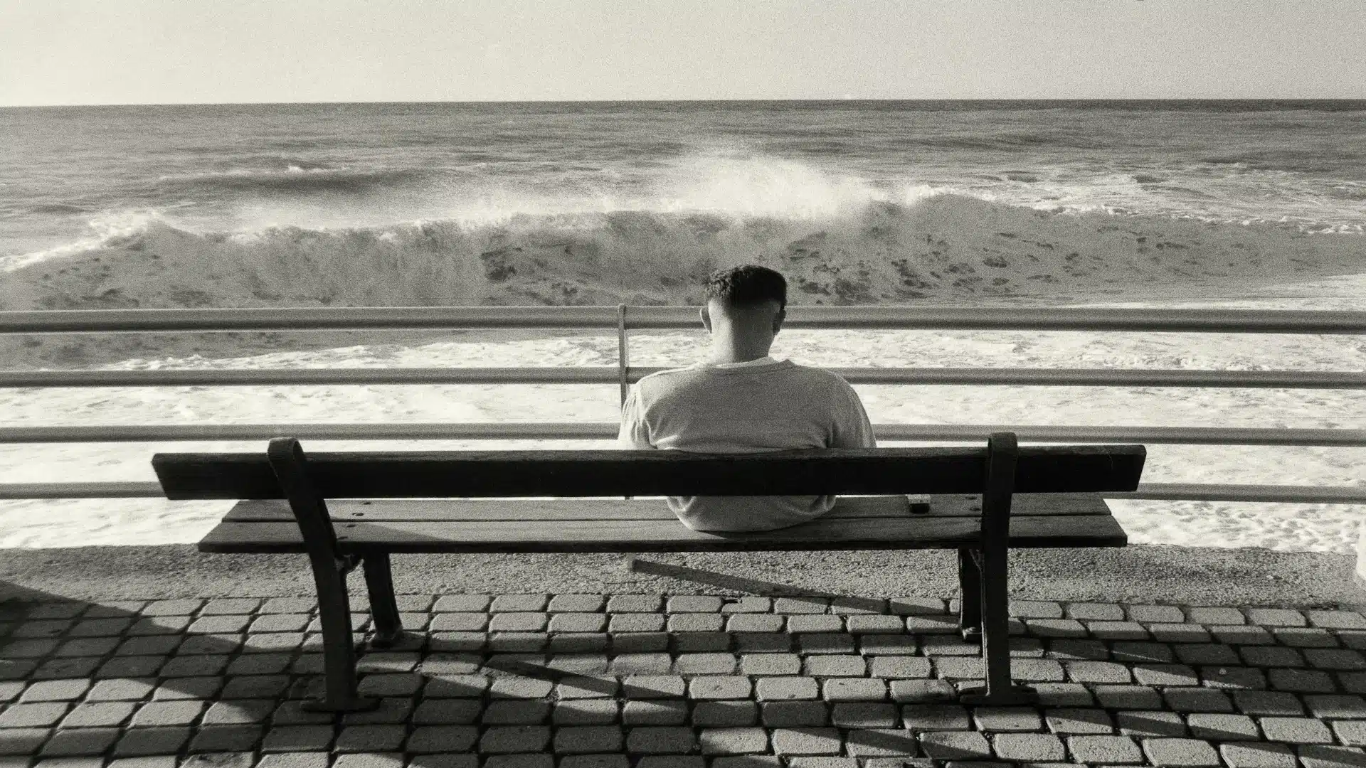 man sitting quietly thinking