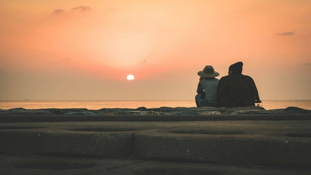 couple watching sunset together