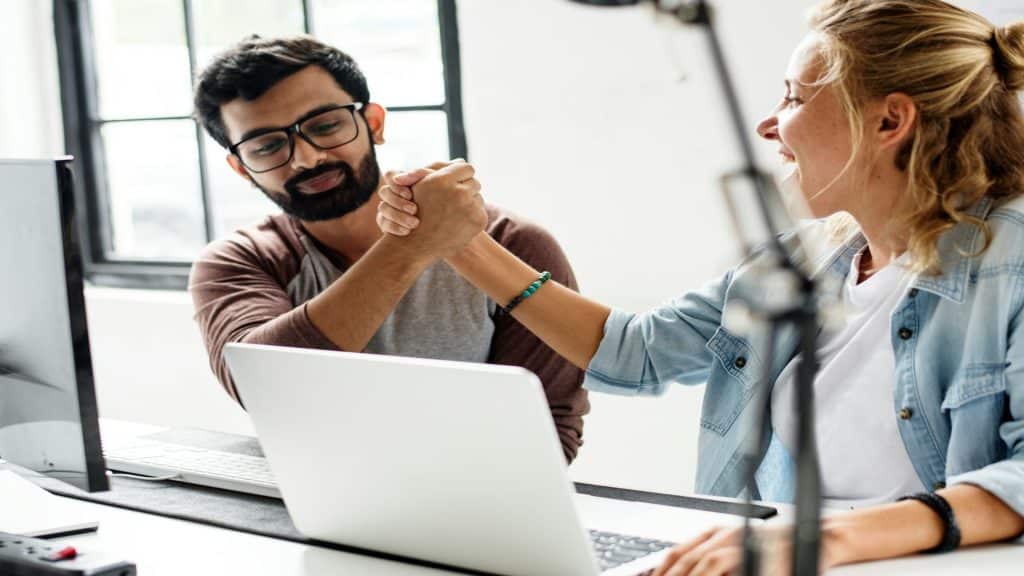 man helping partner