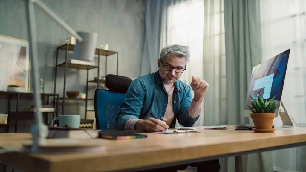 man planning at desk