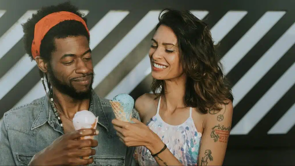 A man and woman eating ice cream