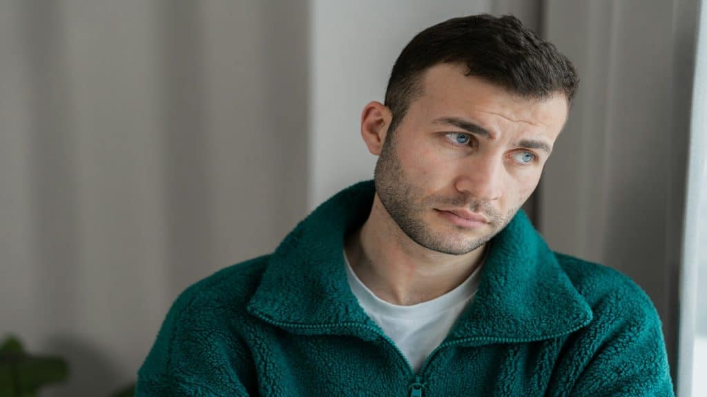 man looking hesitant