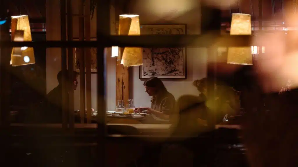 couple talking calmly at table