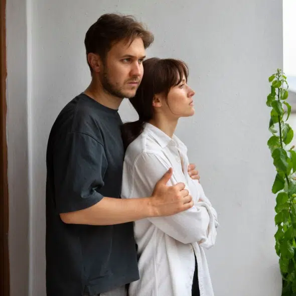 Unhappy couple looking outdoors