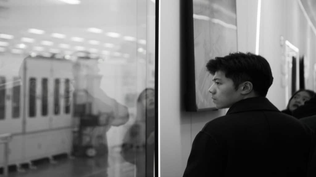 person looking reflective indoors