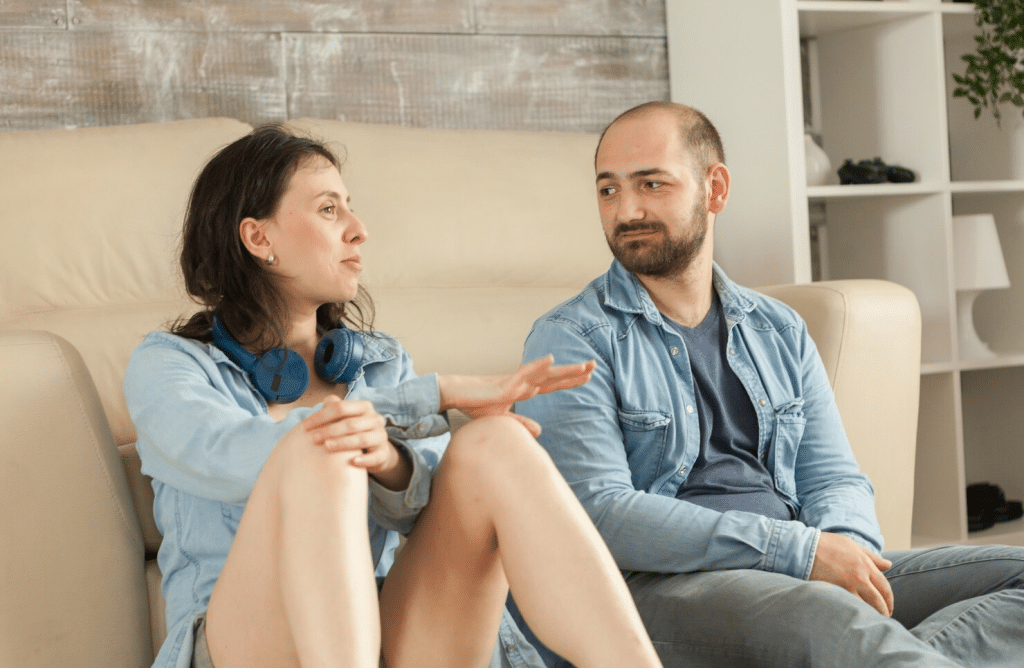 A man listening to woman 