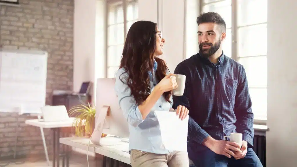 A man and a woman chatting