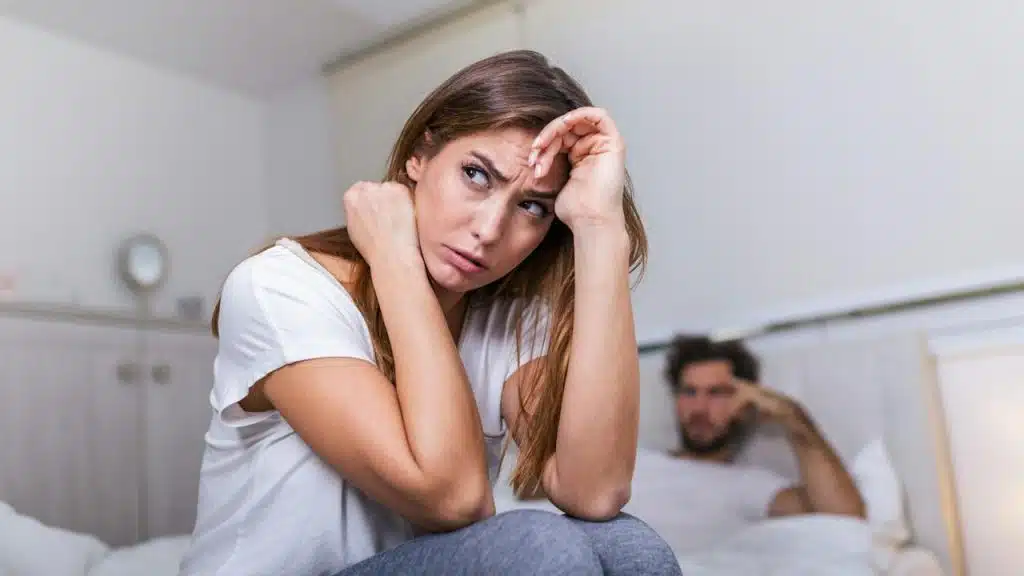 A couple lost in thoughts after a quarrel.