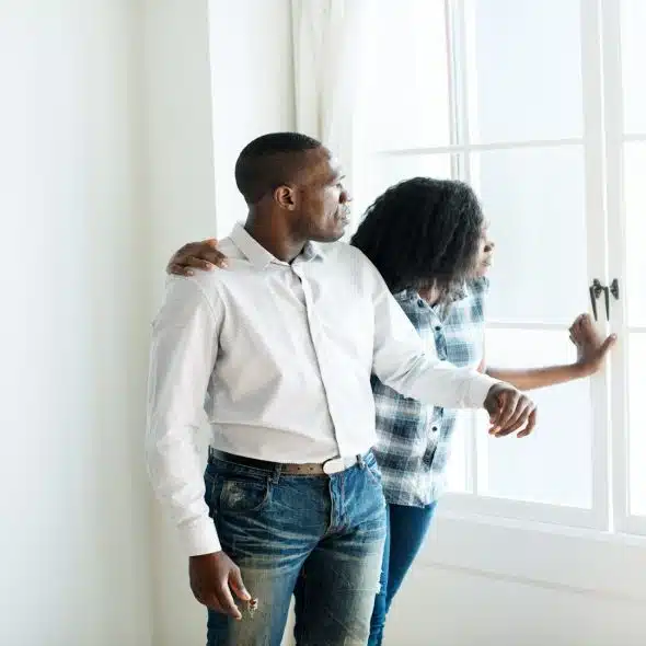 couple having serious conversation indoors