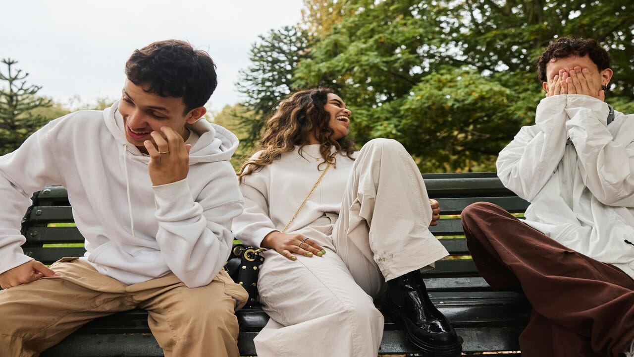 Three friends laughing