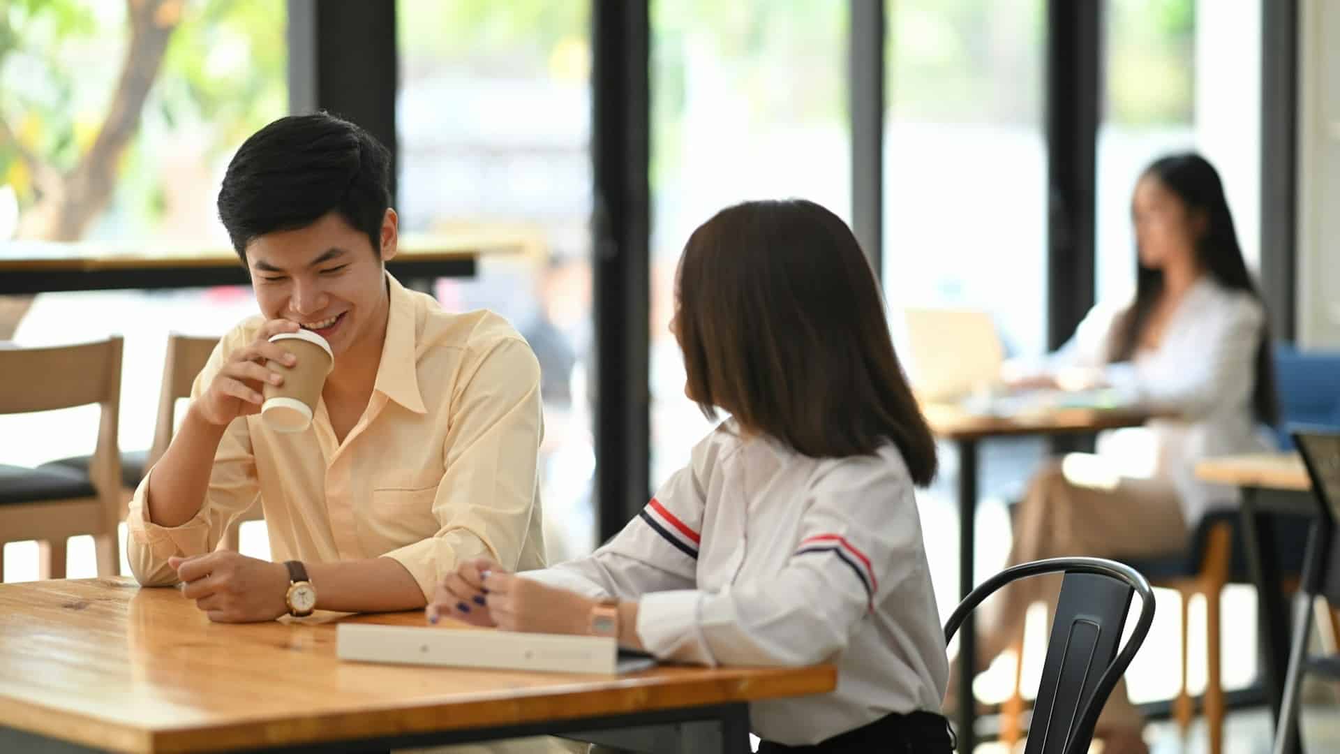 couple discussing calmly at table