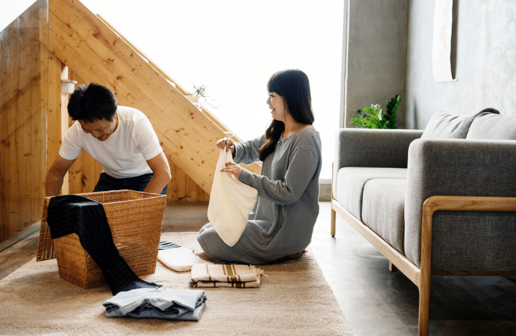 A man helping woman with house chores