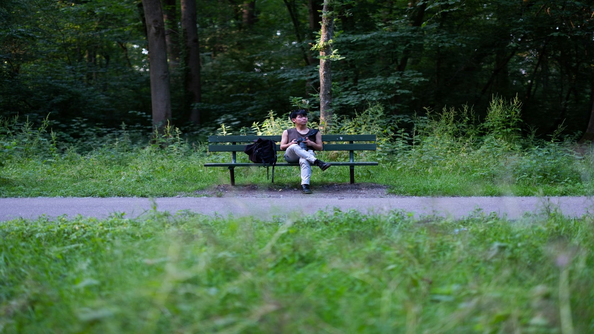 man reflecting while sitting outdoors