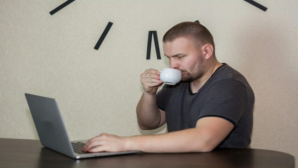 man reviewing busy schedule