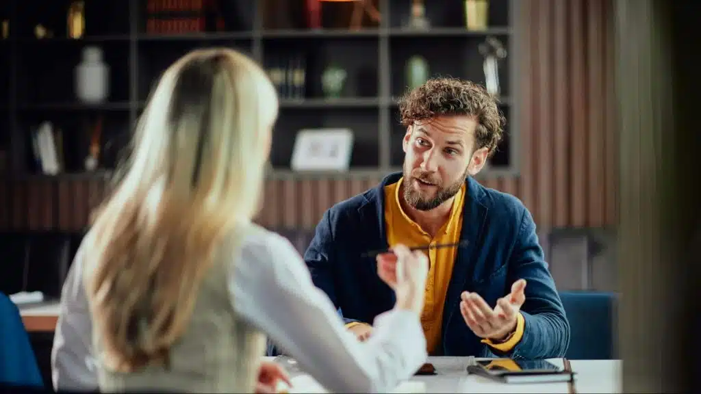 A man and woman talking 