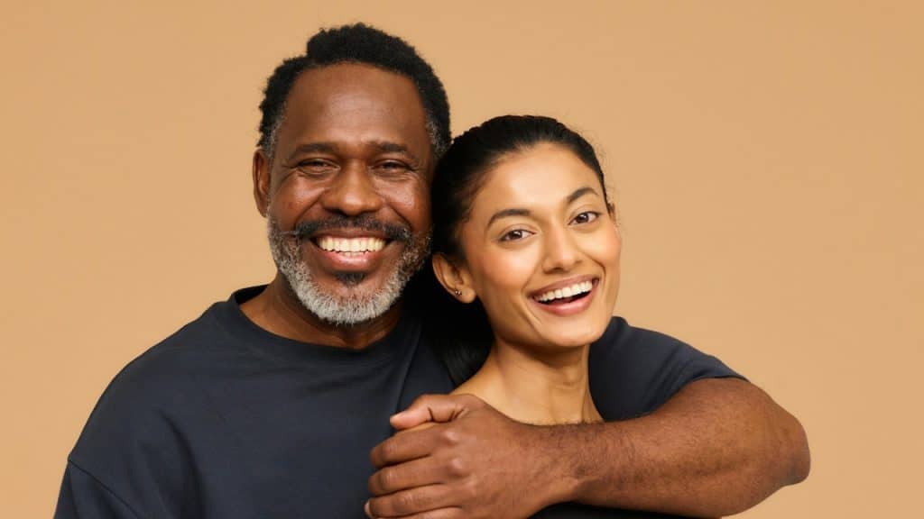 A couple posing for a picture.
