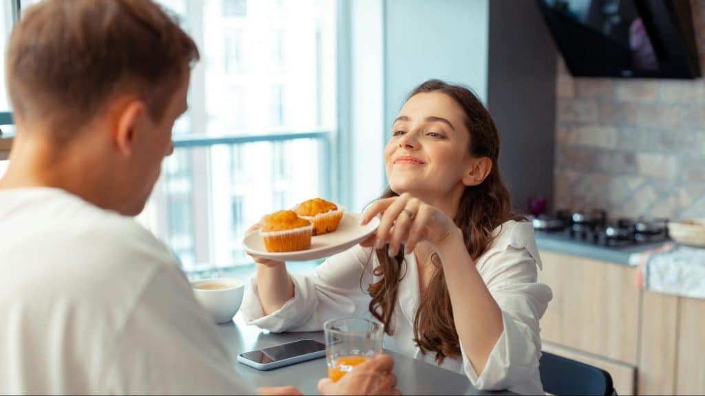 Woman smiling at the man