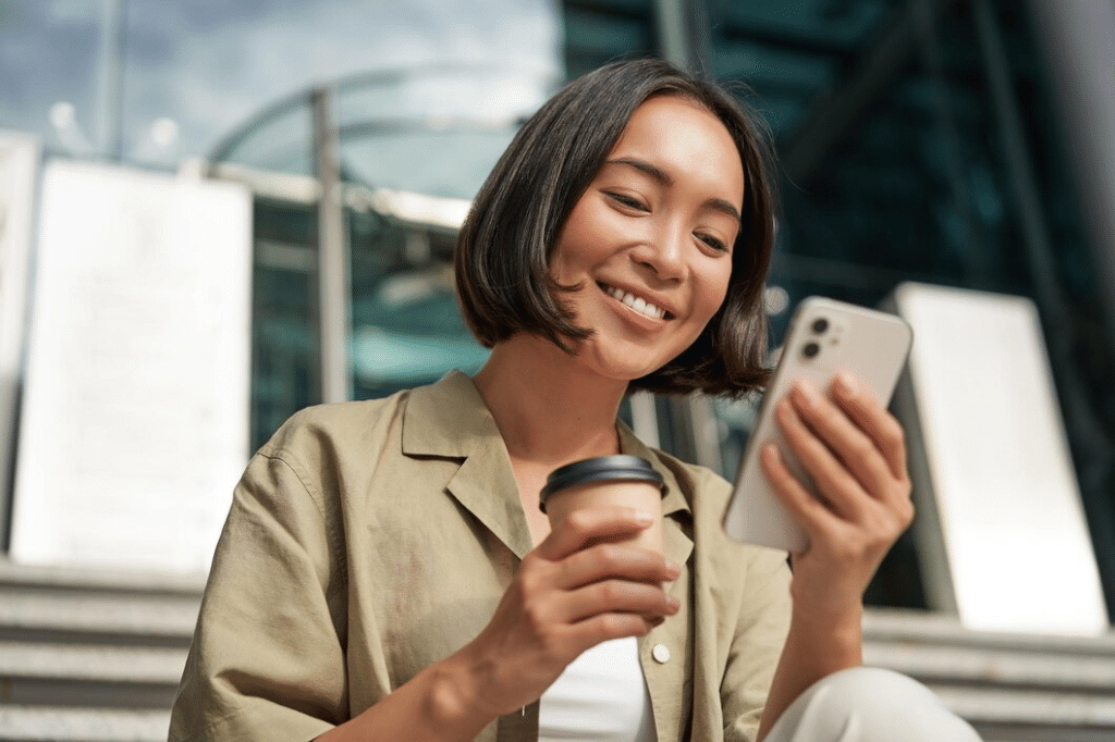 Woman outdoors using phone