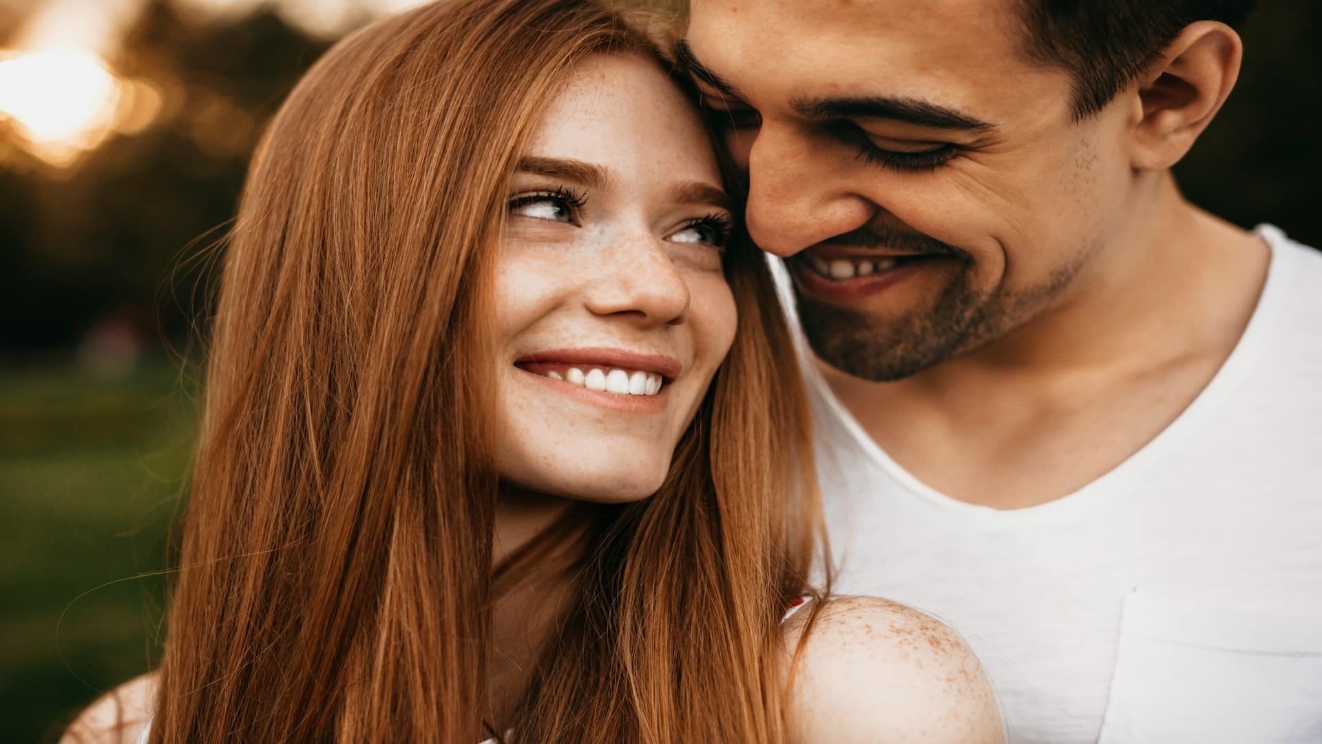 person smiling during early relationship