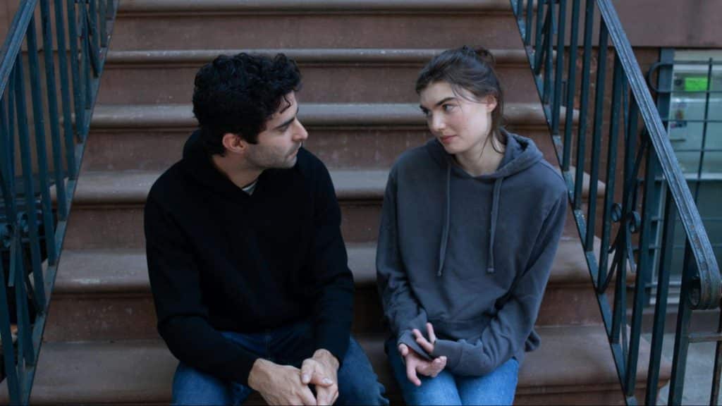 A man and woman talking