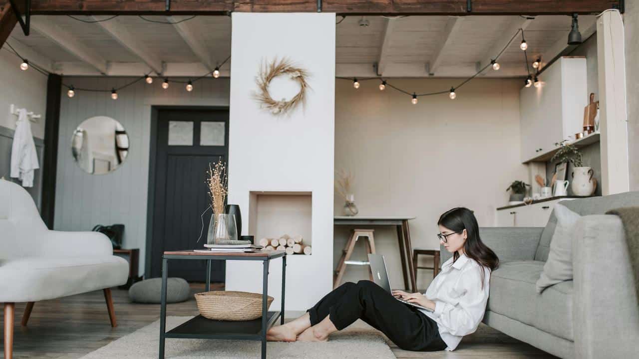 A woman sitting on the floor