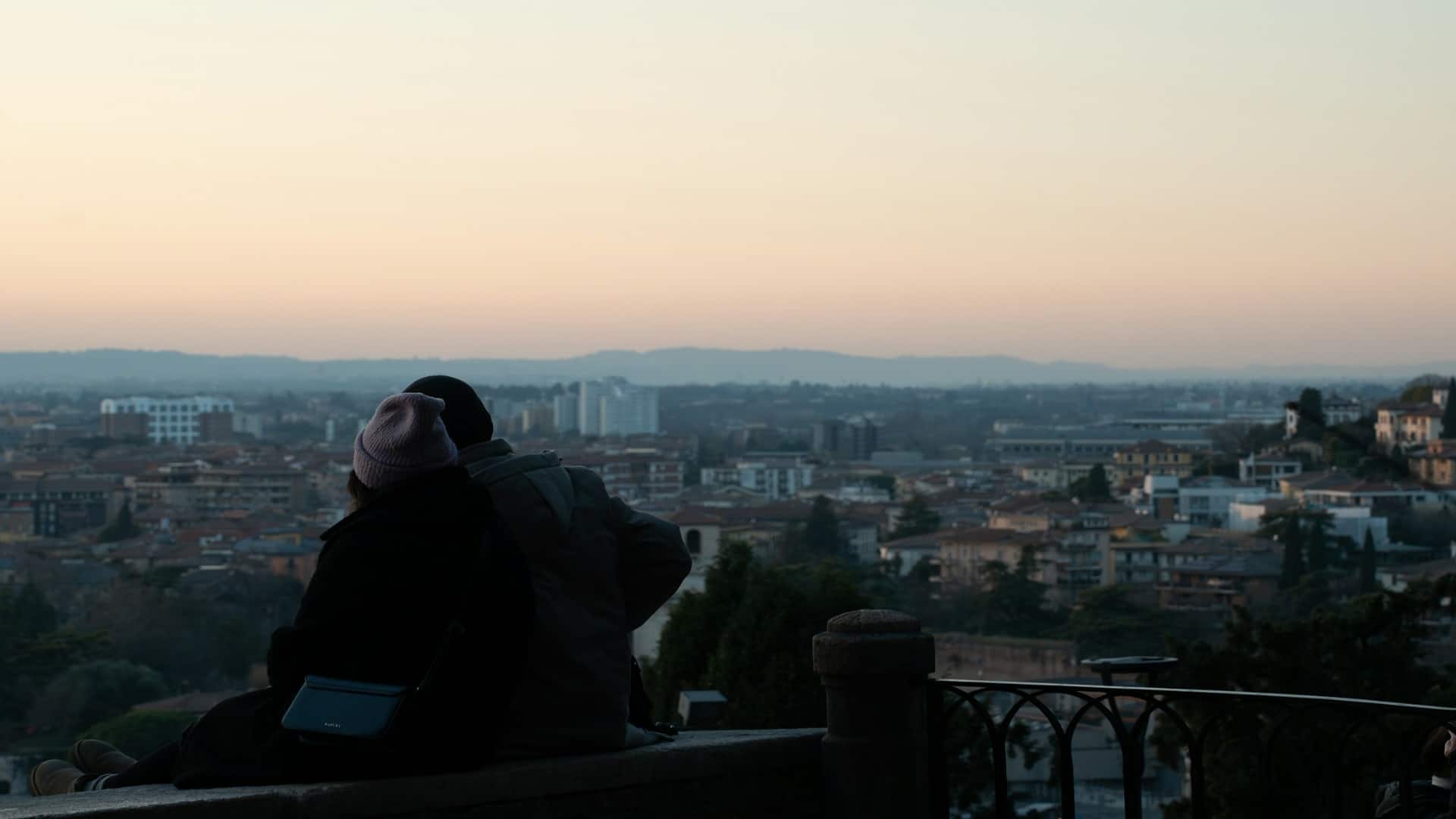couple watching sunset together