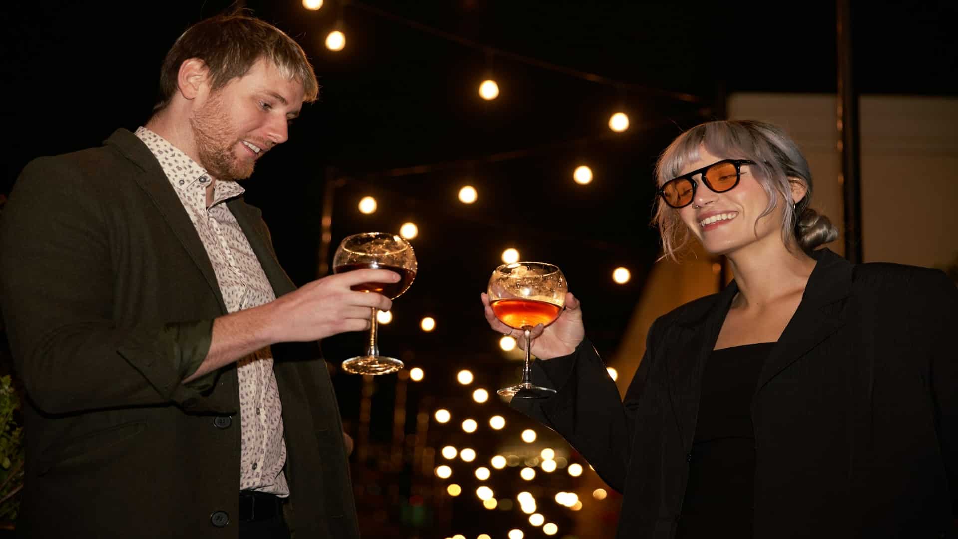 couple smiling at gathering