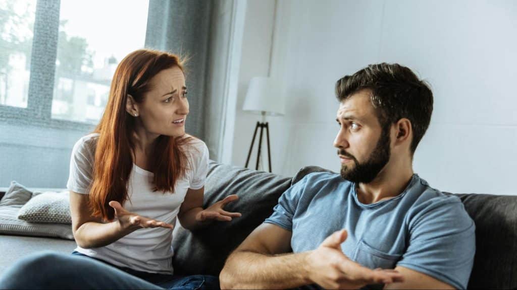 A man and woman arguing about something