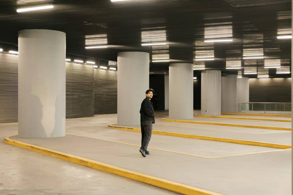 man walking city alone