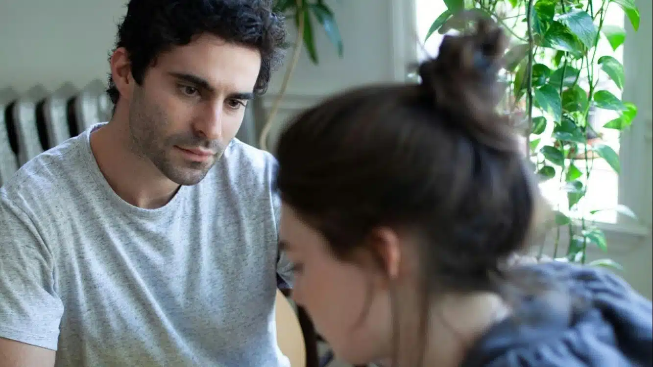 A man staring at the woman