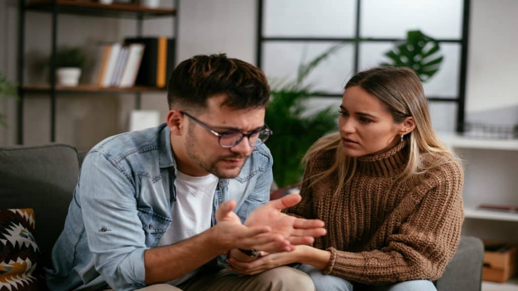 couple appearing confused during discussion