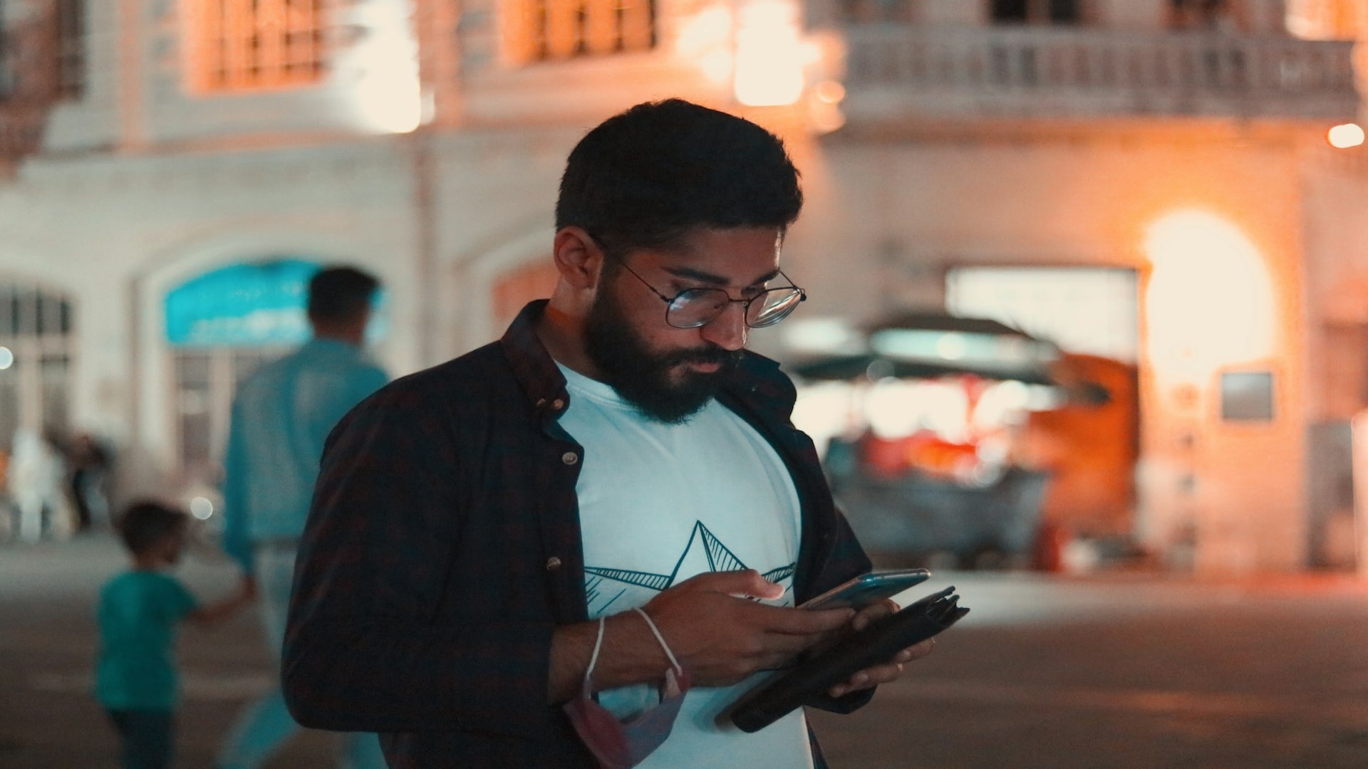 person texting with neutral expression