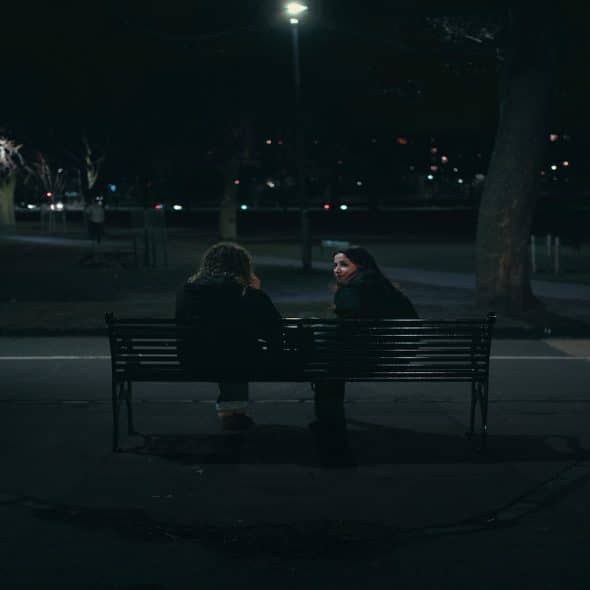 couple sitting apart after disagreement