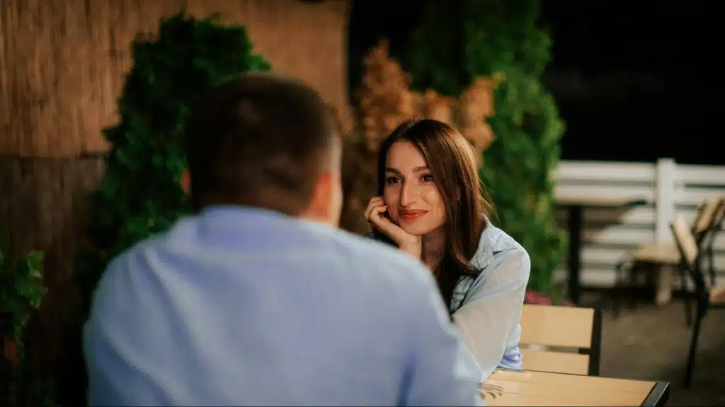 Woman observing a man