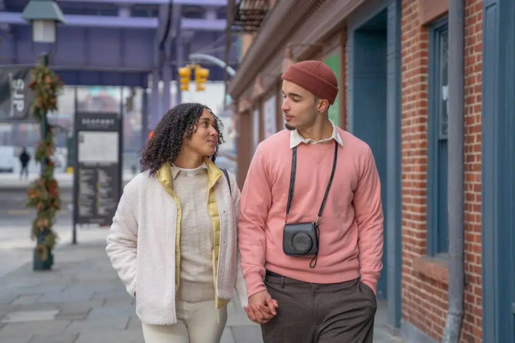 couple talking and walking on street