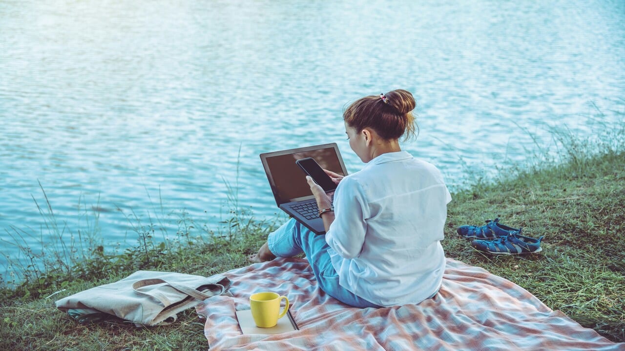A woman having alone time by the water