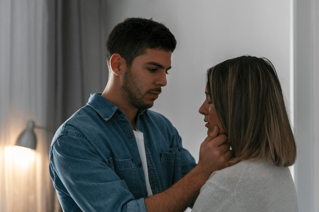 A man apologizing to woman 