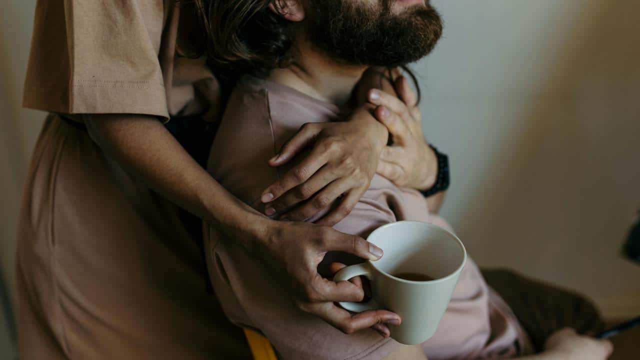A person hugging their partner