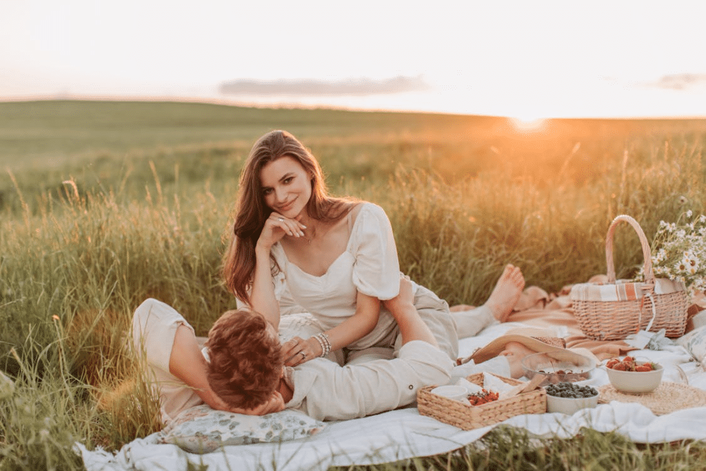 A man and a woman are having a picnic