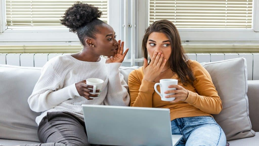 Colleagues gossiping at work