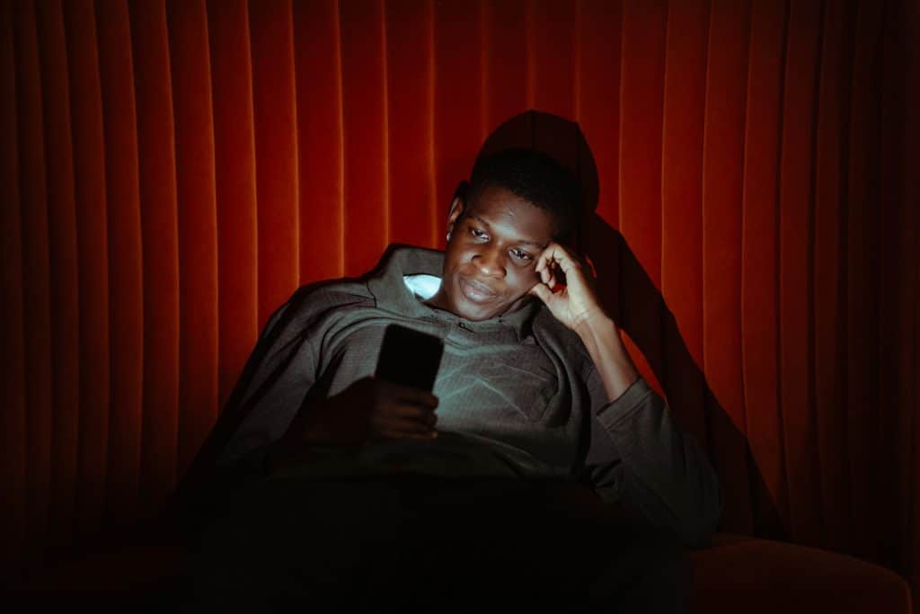 scrolling phone evening
