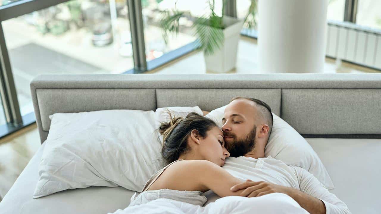 A couple lying in bed
