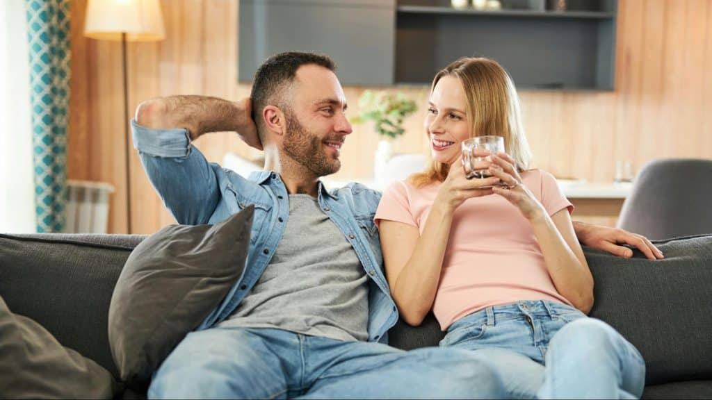 A man and woman looking at each other