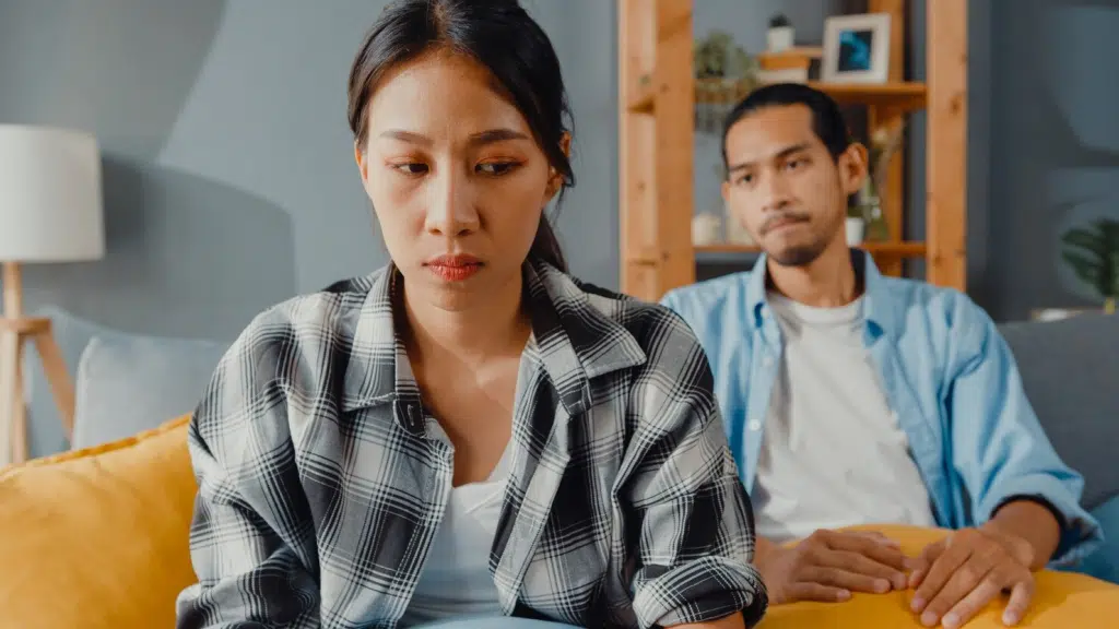 Woman turning her back from a man