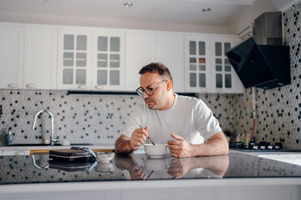 man eating alone
