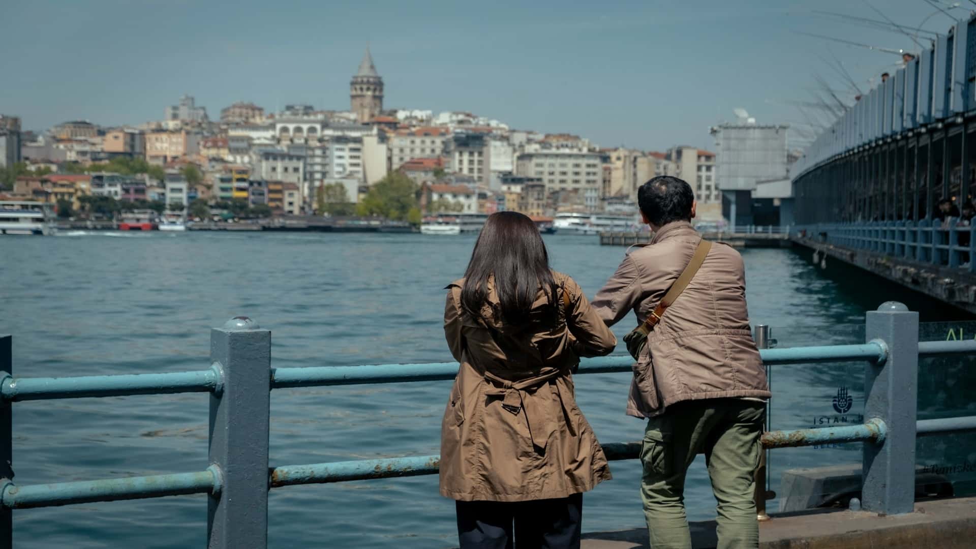 man standing beside partner