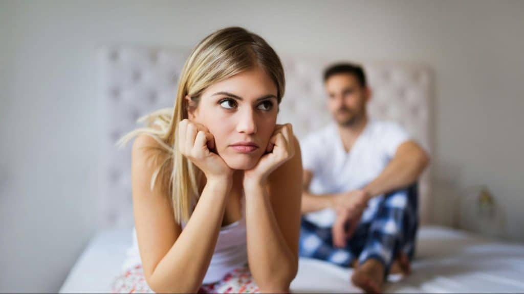 A man and woman not talking to each other