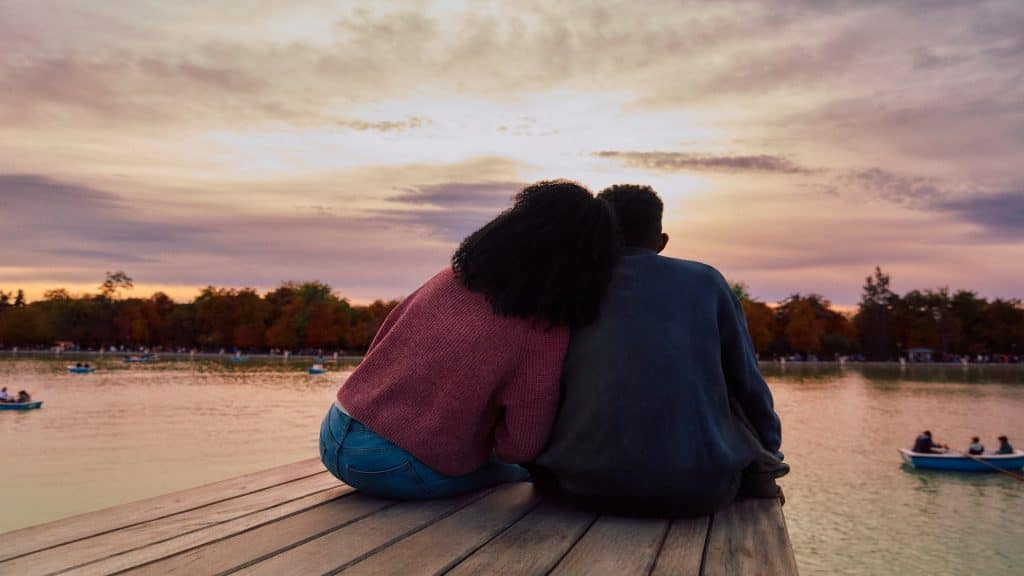 couple watching sunset together
