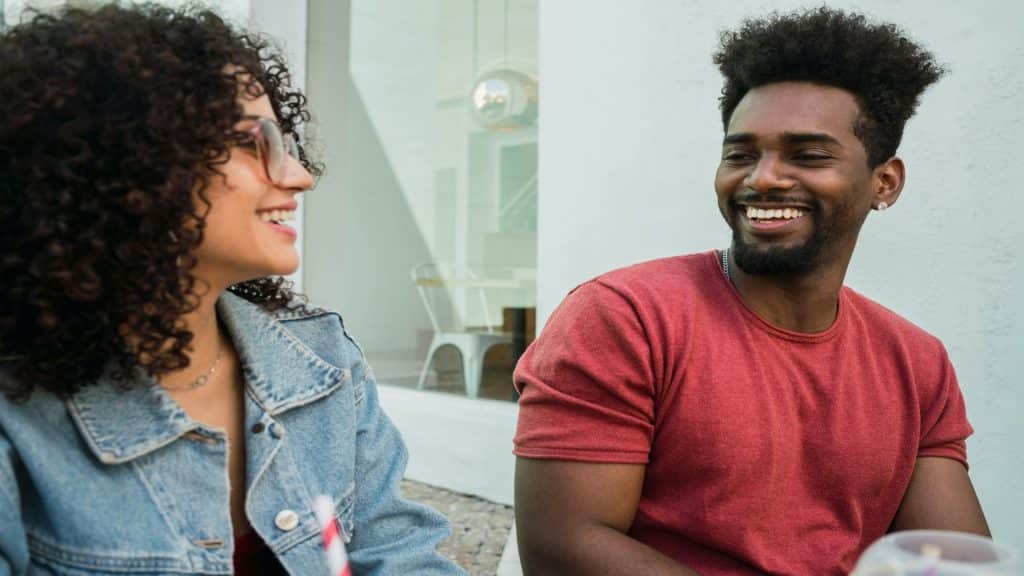 couple smiling during conversation